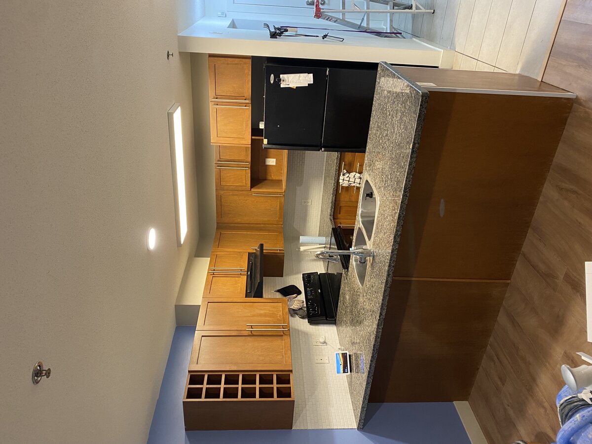 Kelowna painting companies - kitchen cabinet refinishing before with wood cabinets